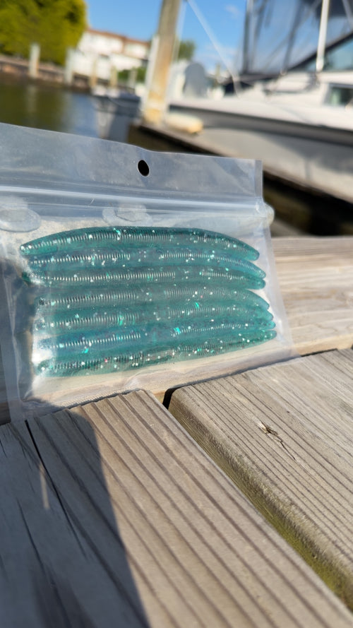 Bait Bros Tackle 5-inch stick bait fishing lure with realistic design and vibrant color for freshwater and saltwater fishing.